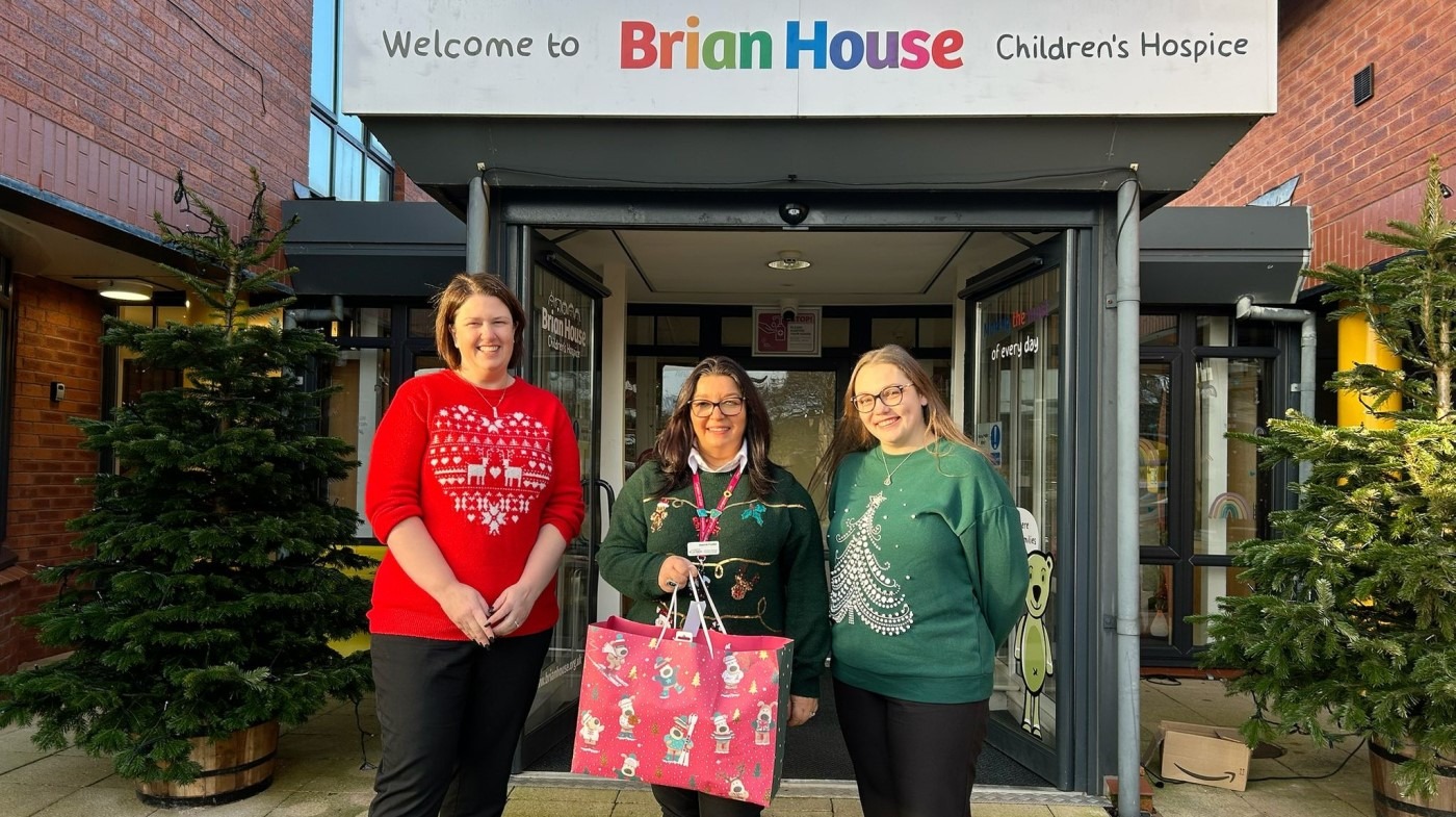 Breck Christmas donation at Brian House